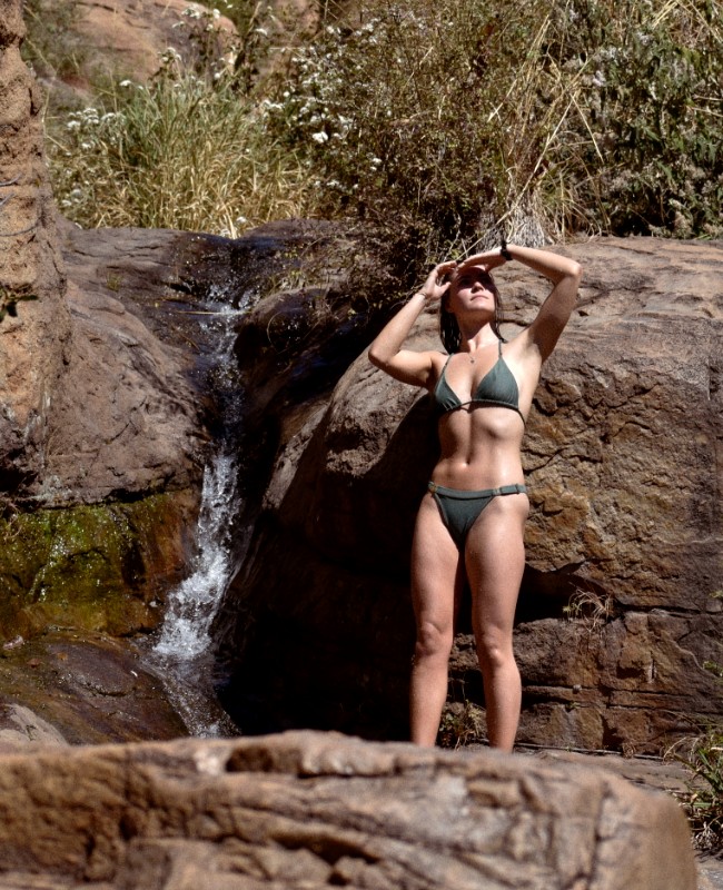 sustainable bikini and waterfall